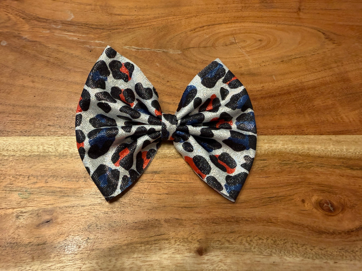 Holographic red silver and blue leopard print